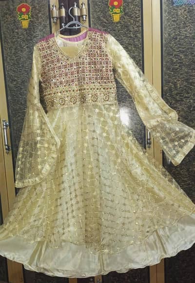 Sleeve cut maxi in pale golden color with stone embalishment