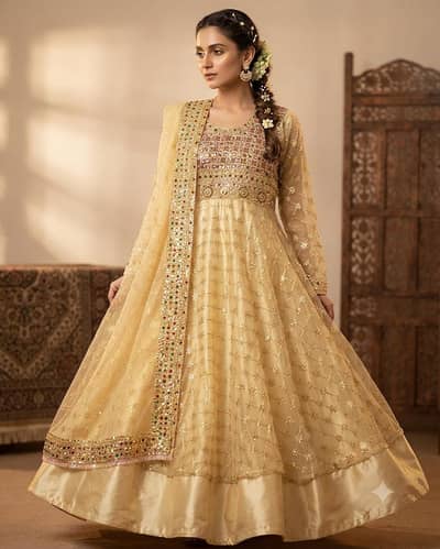 Sleeve cut maxi in pale golden color with stone embalishment