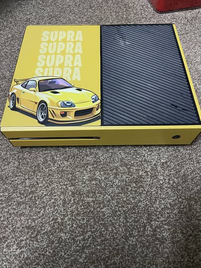 Xbox one console with 22 games and 2 controllers