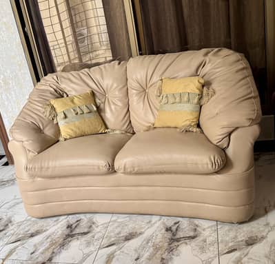 Comfortable 2 Seater Beige Leather Sofa in Clean Condition