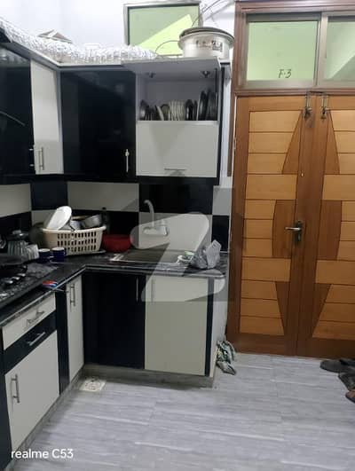 Portion for Sale || 2BED DD || CORNER || LEASED|| 1st Floor | West Open | Fully Tiled| Best Door | Aluminum windows & Bathroom Doors | American Kitchen | Like New | Leased, Boundary wall GATTED Society Nagori City near Gohar Green City | Intercom