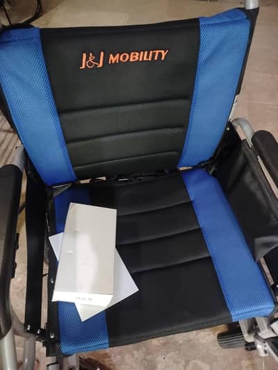 ELECTRIC WHEELCHAIR BRAND NEW JUST 1KM USED