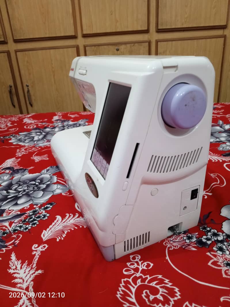 Janome 9600 Computerized Sewing and Embroidery Macine 12