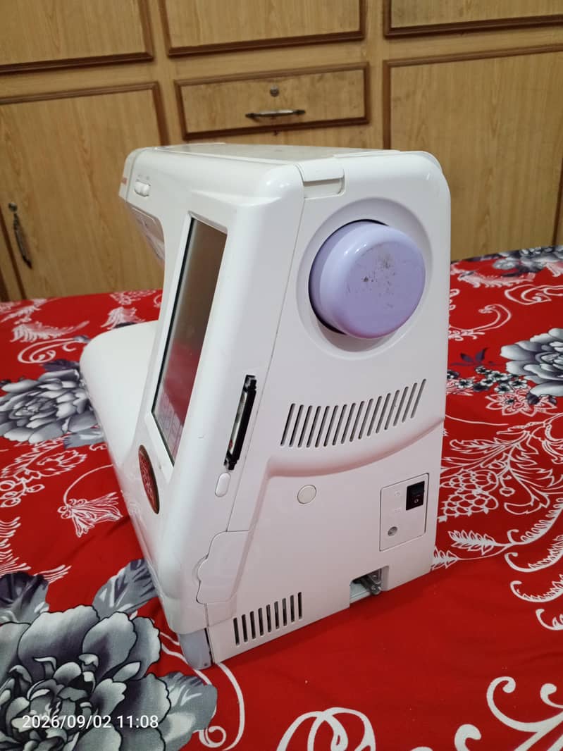 Janome 9600 Computerized Sewing and Embroidery Macine 13