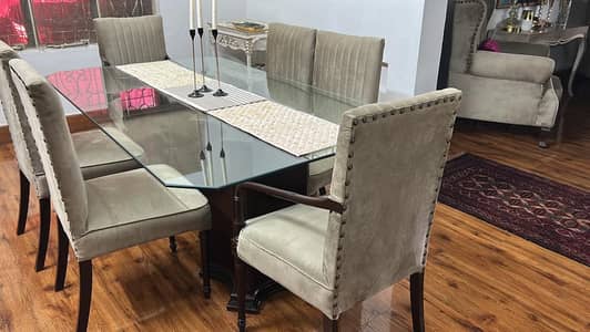 6 seater dinning table velvet covered seats with glass table