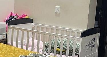 Baby crib with bedding