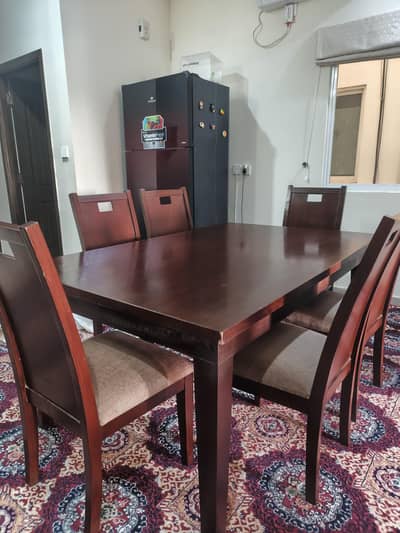 6 seater Wooden dining table set with cushioned chairs