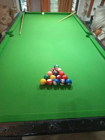 snooker billiards table with 16 balls, 4 by 8 aala condition top light