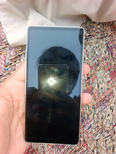 Google Pixel 7a + genmaen charger