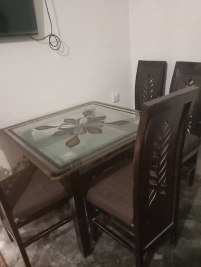 dining table and four chairs