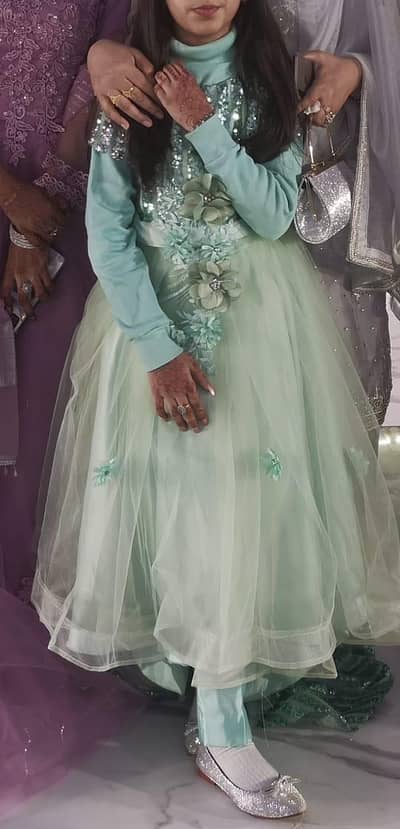fishtail frock along with high neck and trouser