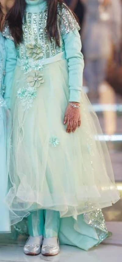 fishtail frock along with high neck and trouser