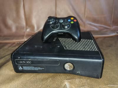 gaming console for sale  with one controller and one game