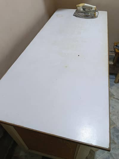 wooden table with drawers and compartment