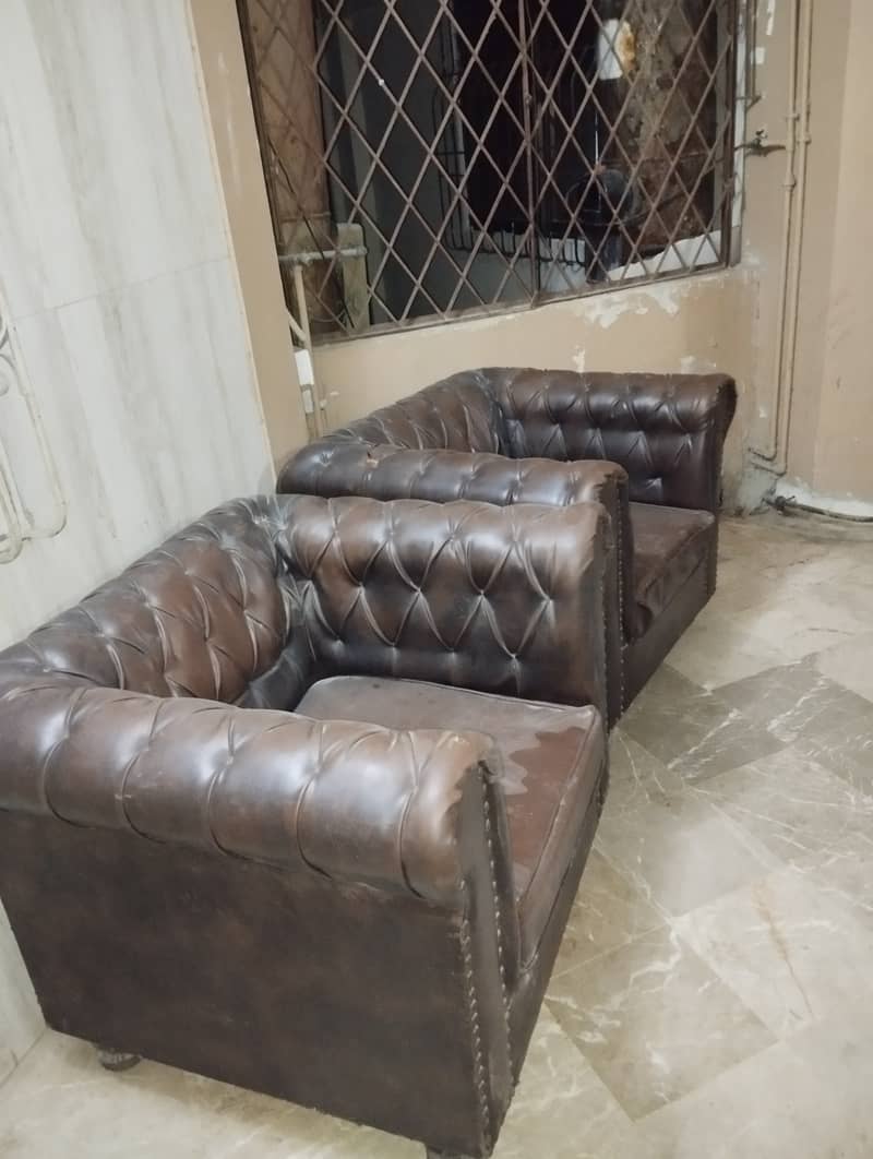 Two 1-seater sofas 1