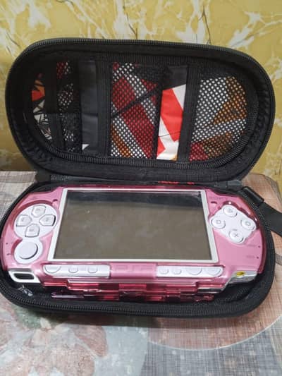 Psp 2000 (jail break) with 5v 2A charger 8gb sd card with its case