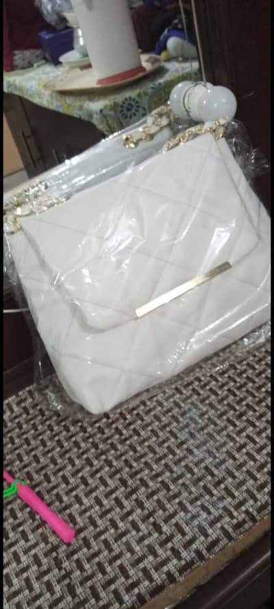 White quilted handbag