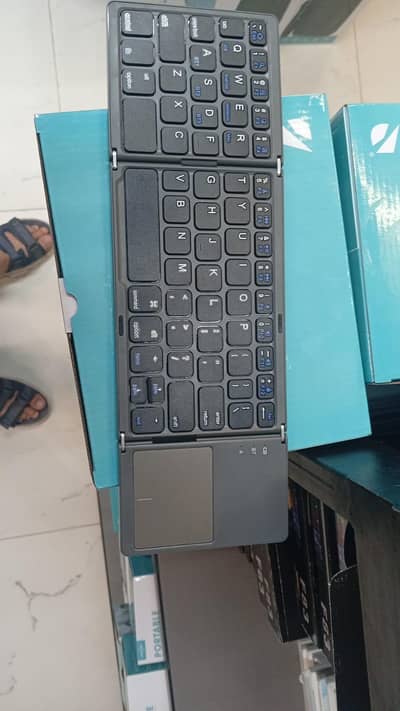 Foldable Bluetooth Wireless Keyboard with Built-in Touchpad for Sale