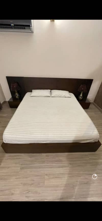 King sized bed with side tables