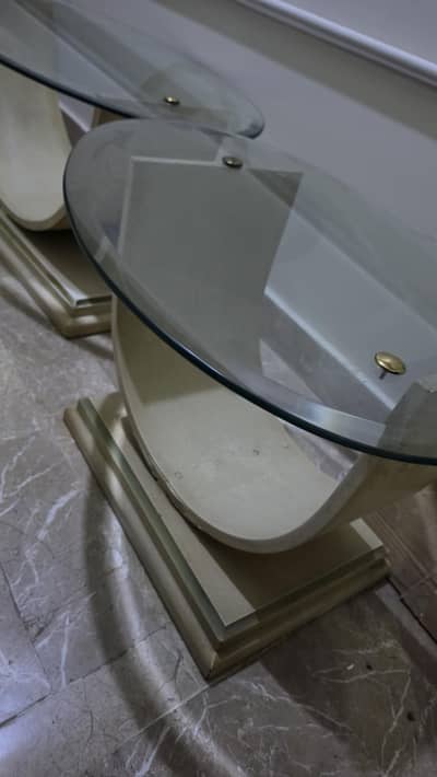 set of 2 side tables and a center table