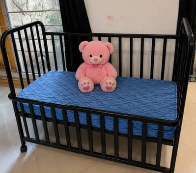metal baby cot