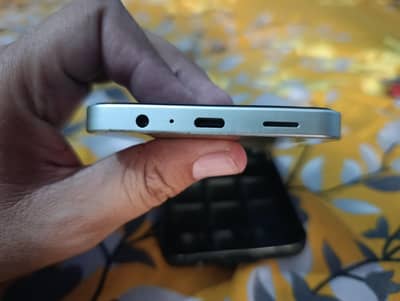 Samsung Mobile A06 4 128 GB Mobil aur charge
