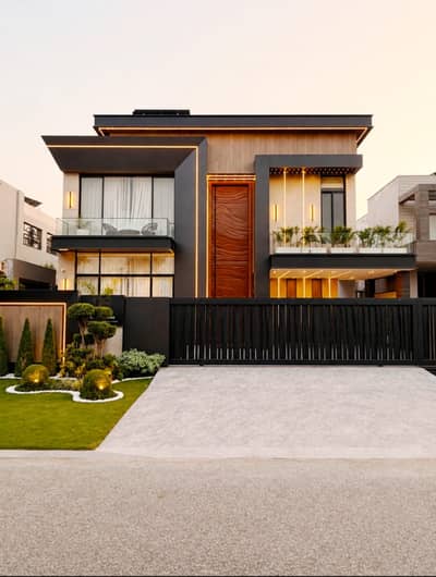 ULTRA MODERN BRAND NEW FULL BASEMENT FULLY FURNISHED BUNGALOW WITH SWIMMING POOL, HOME THEATRE LIFT AND ROOFTOP IS AVAILABLE FOR SALE ON PRIME LOCATION OF PHASE 6 NEAR DOLMEN MALL WITH 15KVA SOLAR SYSTEM INSTALLED .