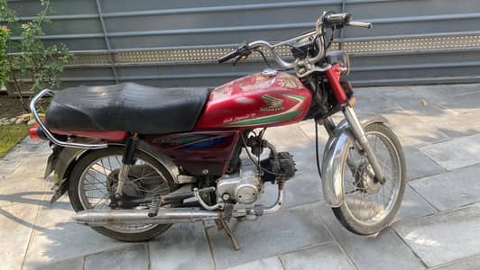 Honda CD 70 red color