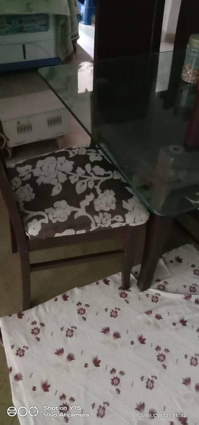 beautiful glass dining table with 6 chairs for sale