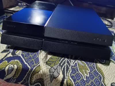 PS4 Fat 500GB + 2 Controllers + Games – Good Condition