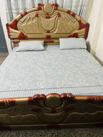 Double bed and side table