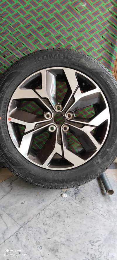 Alloy wheel with tyre