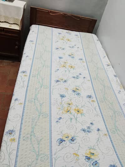 wooden single bed