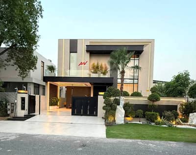 One Kanal Brand New Luxury Ultra-Modern Design Most Beautiful Full Basement Fully Furnished Home Theater Swimming Pool GYM Bungalow For Sale At Prime Location Of DHA Lahore Near To Park Masjid & Defence Raya