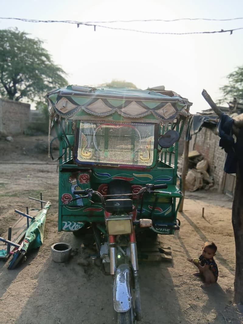 Chingchi loaded Rickshaw. 5