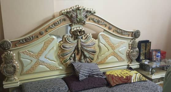 bed and dressing with wardrobes
