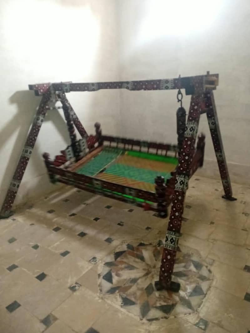 لکڑی کا پینگھا 1
