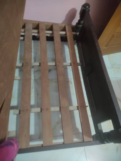 Single wooden bed