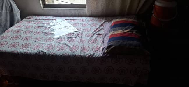 I am selling single bed pure wood