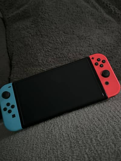 Nintendo Switch – Lightly Used + Games Installed – Excellent Condition