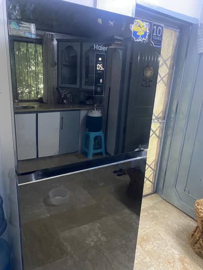 Haier Glass door refrigerator new condition