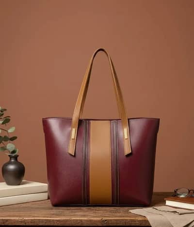 hand bag for women ( maroon colour) new condition