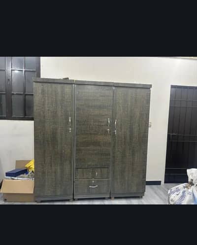 Matching three door wardrobe and dressing table