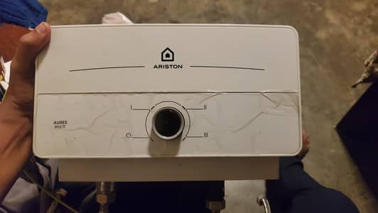 Ariston Aures Multi instant electric water heater.