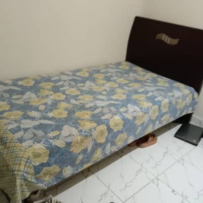 Wooden bed for sale slightly used