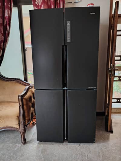 Imported Haier 4 door fridge with original warranty and receipt
