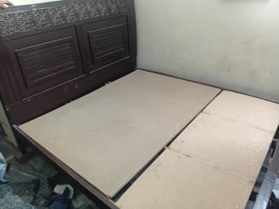 bed with 2 side tabkes and 1 dressing table