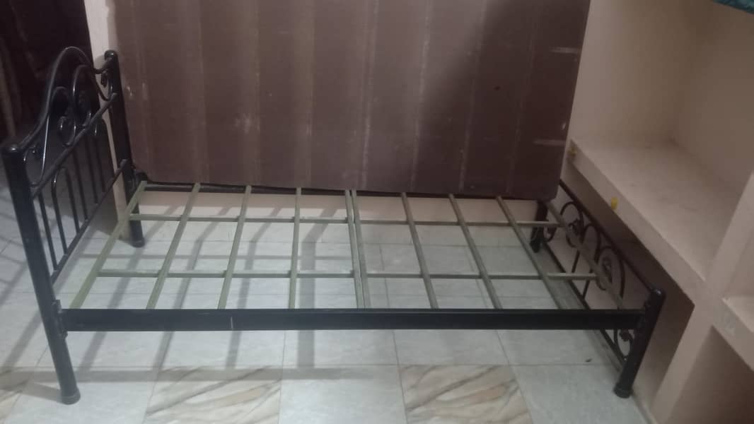 2 Single Iron Beds 1