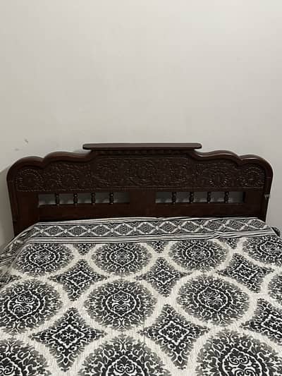 Single wooden bed