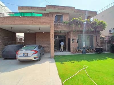 1 Kanal Used Proper Double Unit Most Beautiful House For Sale At Prime Location Of DHA Lahore Near To Park Masjid & Commercial Market.